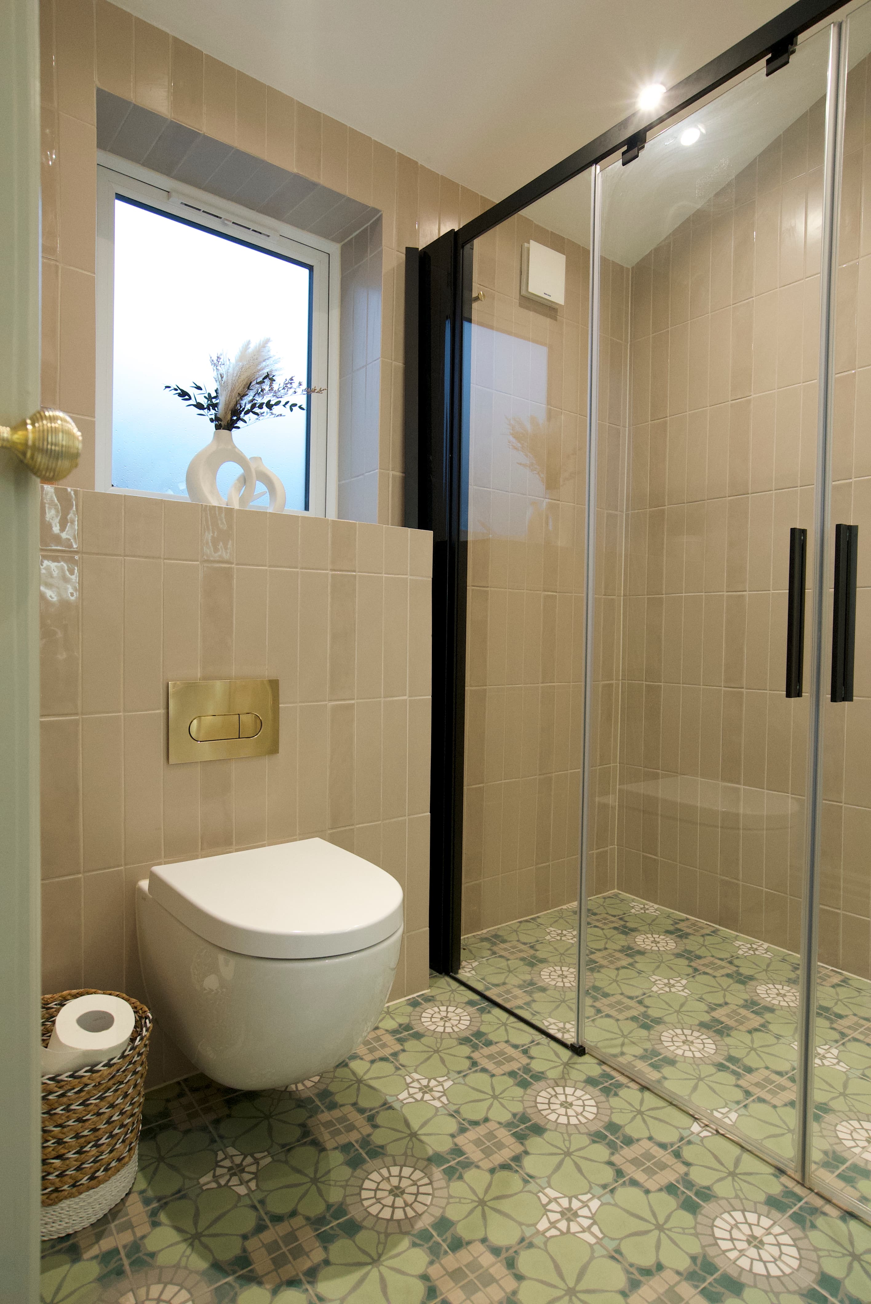 Bathroom detail with wall-hung WC and shower enclosure